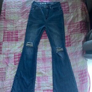 Blue high rise flared jeans with rips